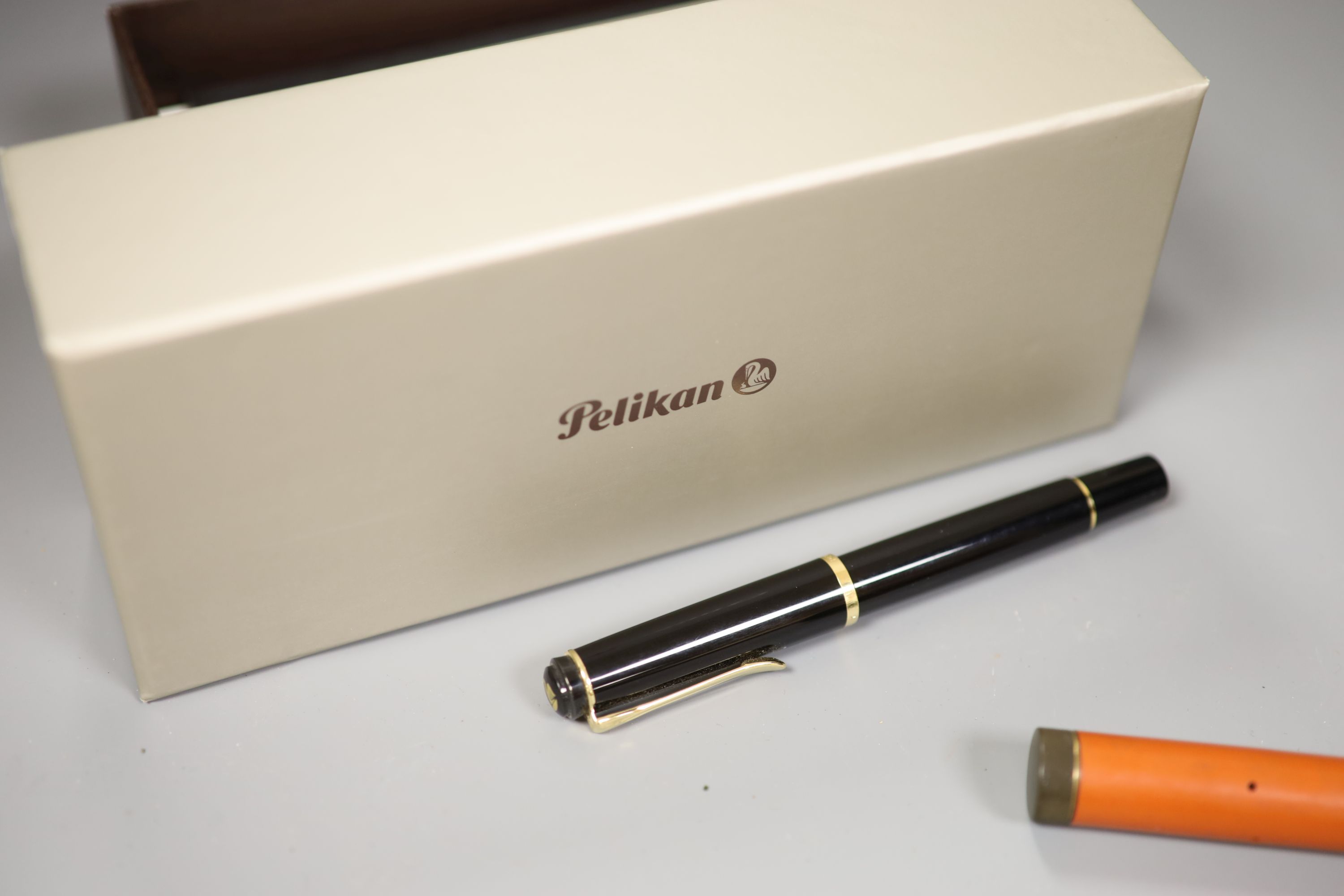 A Parker Duofold fountain pen, a Pelikan fountain pen and a Blackbird fountain pen